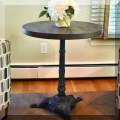 F08. 2 Iron and wood pedestal side tables. 28"h x 24"w 